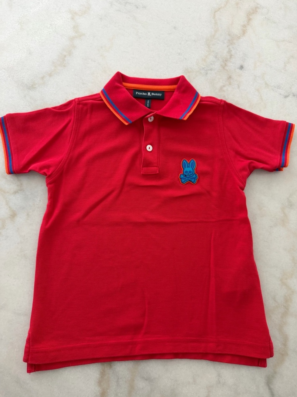 Psycho Bunny Red Polo with Blue Bunny Patch and Multicolor Trim
